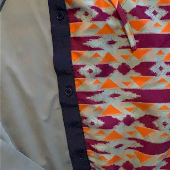 This is a patterned, collared button down dress - Picture 4 of 5
